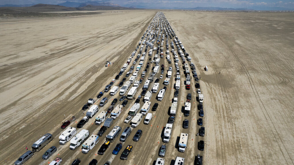 "Traffic Jam and Unusual Weather Conditions Disrupt Exodus from Burning Man Festival"