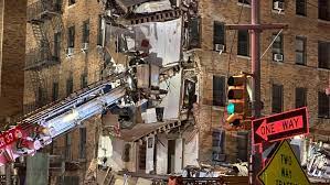 Corner Collapse in Bronx Apartment Building Spurs Firefighters' Search for Trapped Individuals