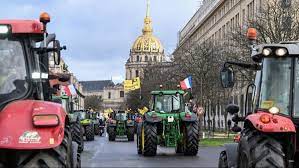 French Farmers Bring Tractors to Paris, Pressuring Macron Ahead of Agriculture Fair