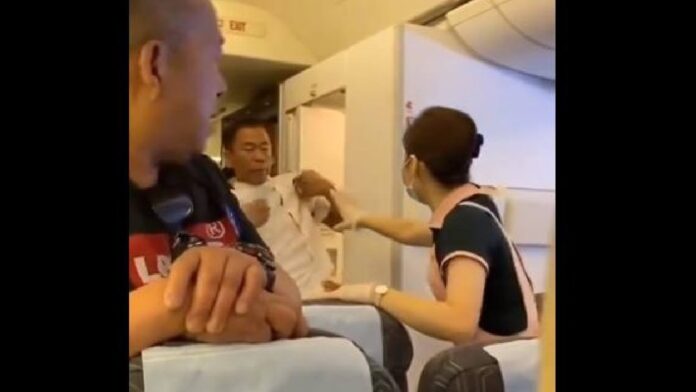 An altercation erupted mid-flight on an EVA Air flight from Taiwan to California, resulting in a violent fight between two passengers. The incident unfolded when one passenger attempted to switch seats due to his neighbor's coughing, sparking a confrontation over the seat.