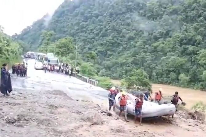 Tragic Landslide in Nepal: 6 Indians Among Missing as Buses Plunge Into River